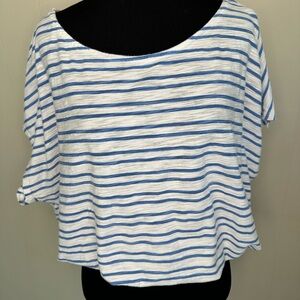 White and blue women’s shirt. Tag says size 14 but fits like a medium.